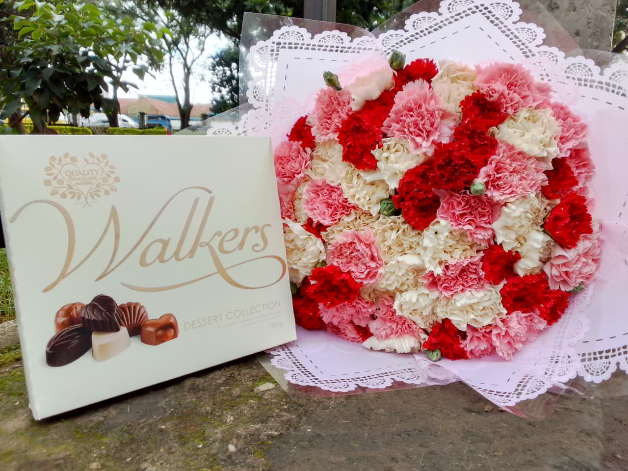 Mixed carnations and chocolate